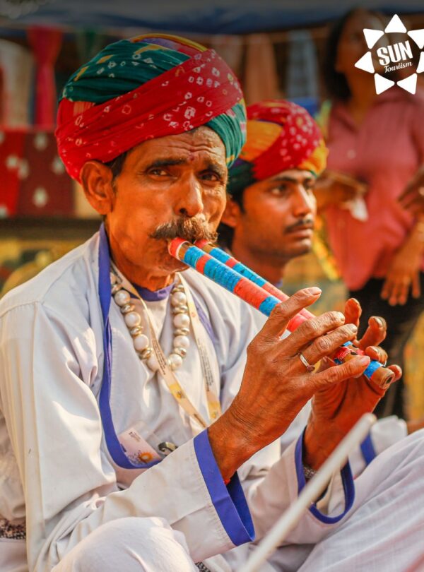 Travelers discovering cultural landmarks and heritage destinations with Sun Tourism